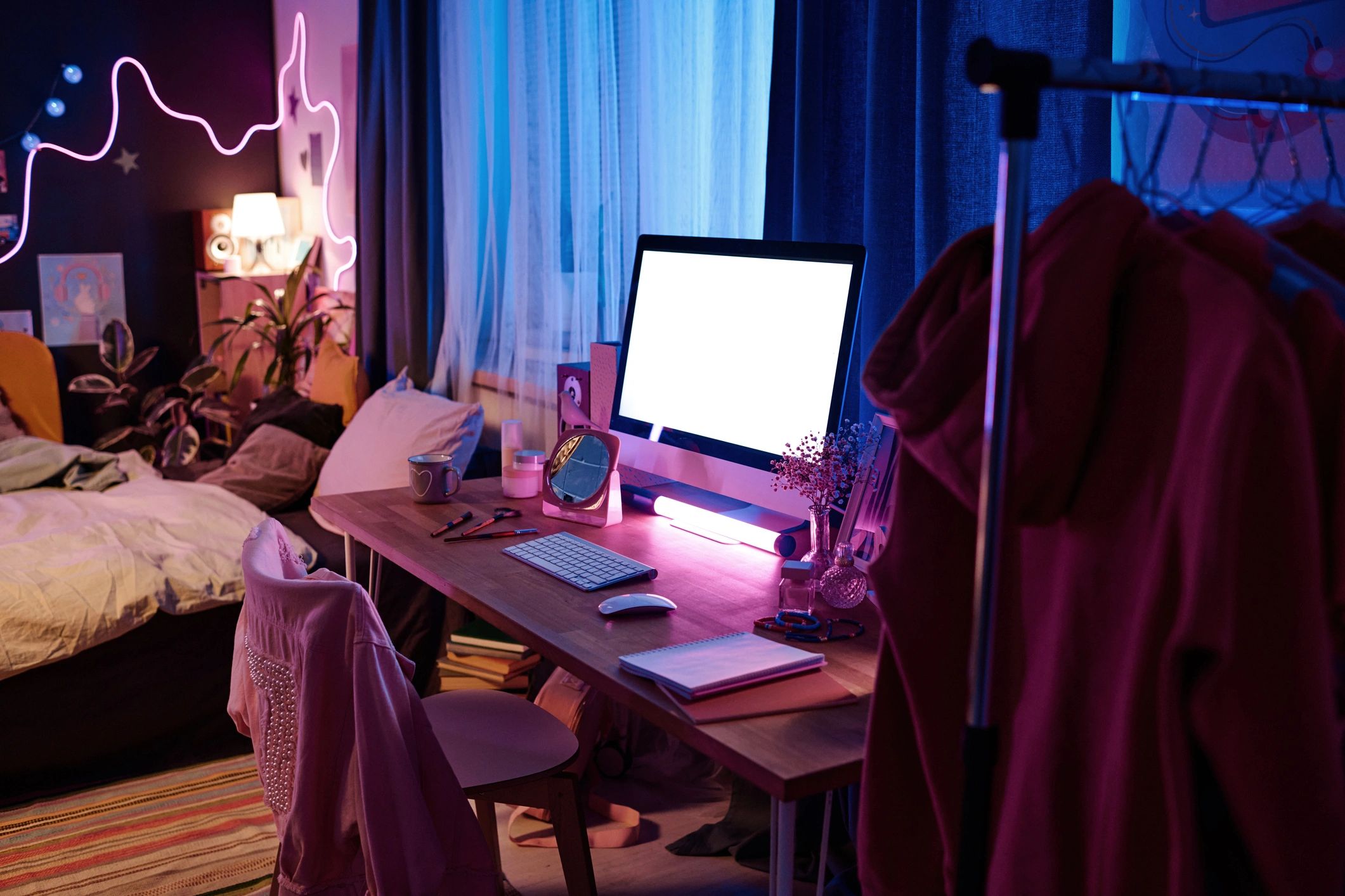 Gaming desk with computer and neon lighting
