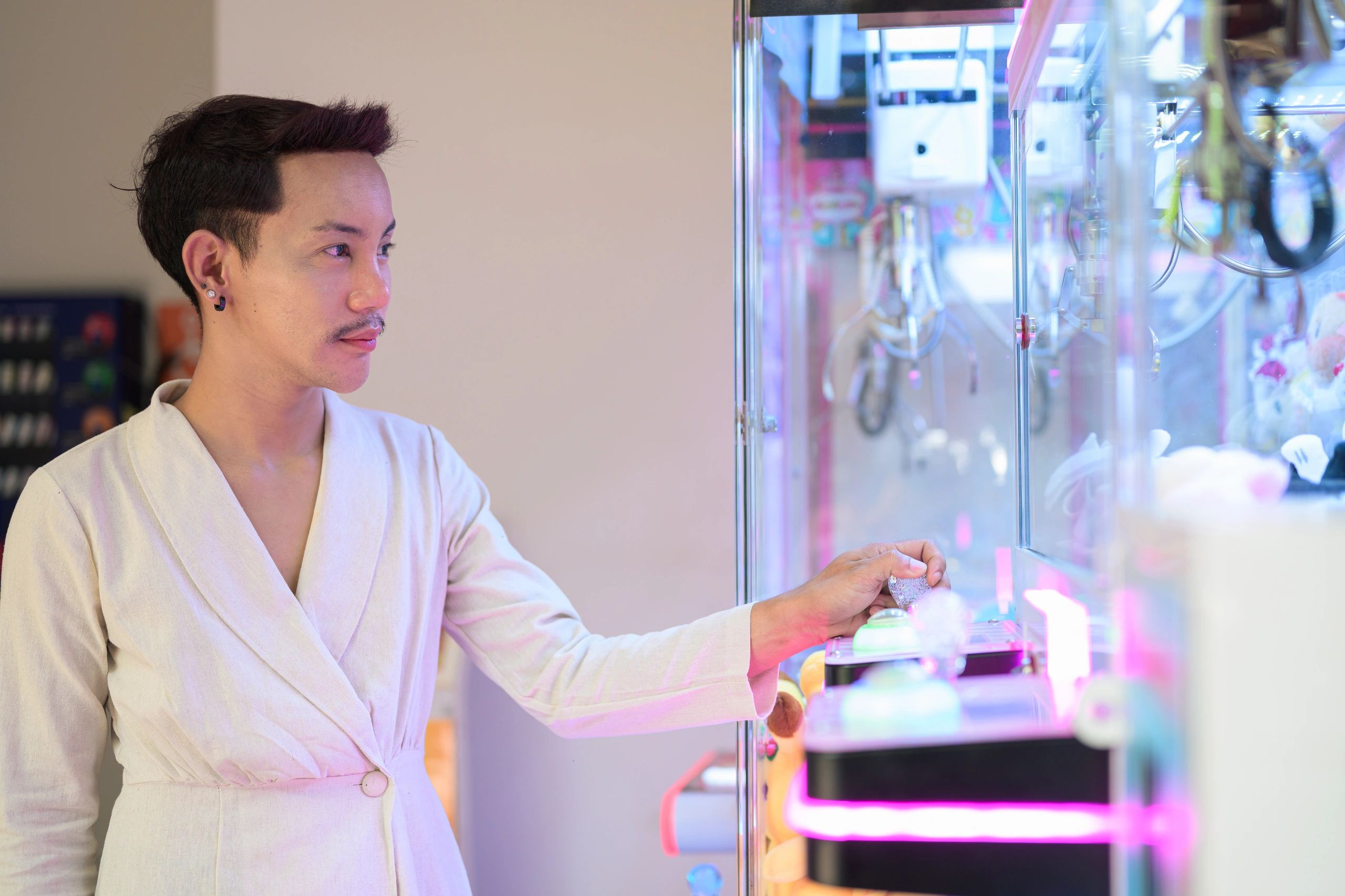 Person playing an arcade game